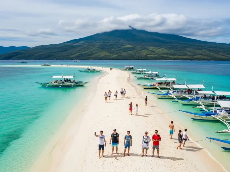 white island camiguin instagram spot Aerial view of White Island sandbar in Camiguin with Mt. Hibok-Hibok in the background.