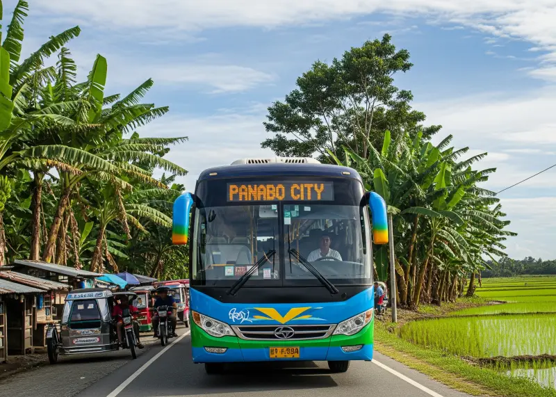 rural bus to panabo city A rural bus driving through banana plantations and rice fields toward Panabo City.